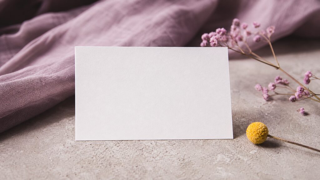 One decisive blank field card isolated from a clutter of unnecessary form slips, ready for a customer''s answer