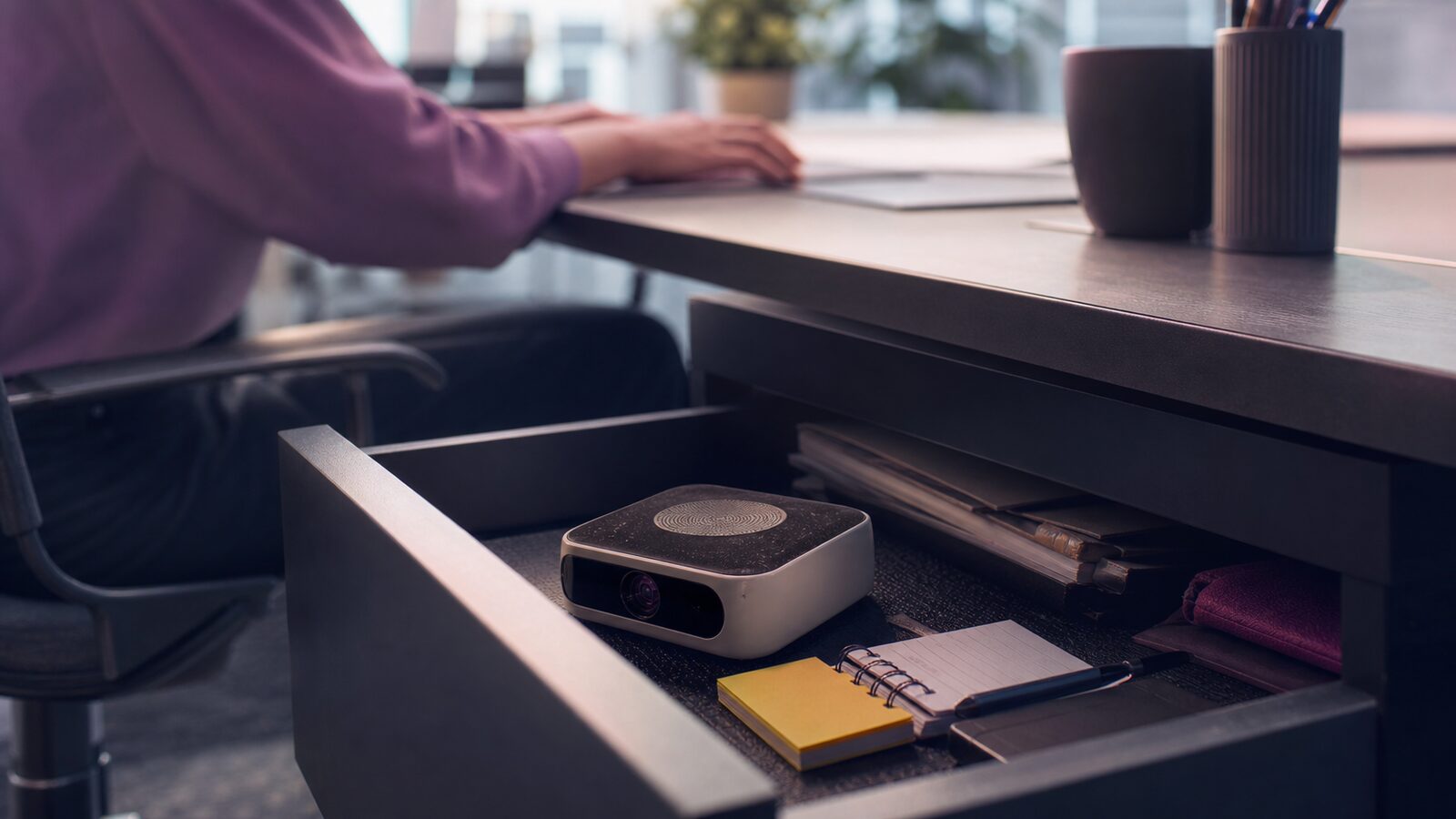 Promising prototype device gathering dust in an open office drawer while daily work carries on above